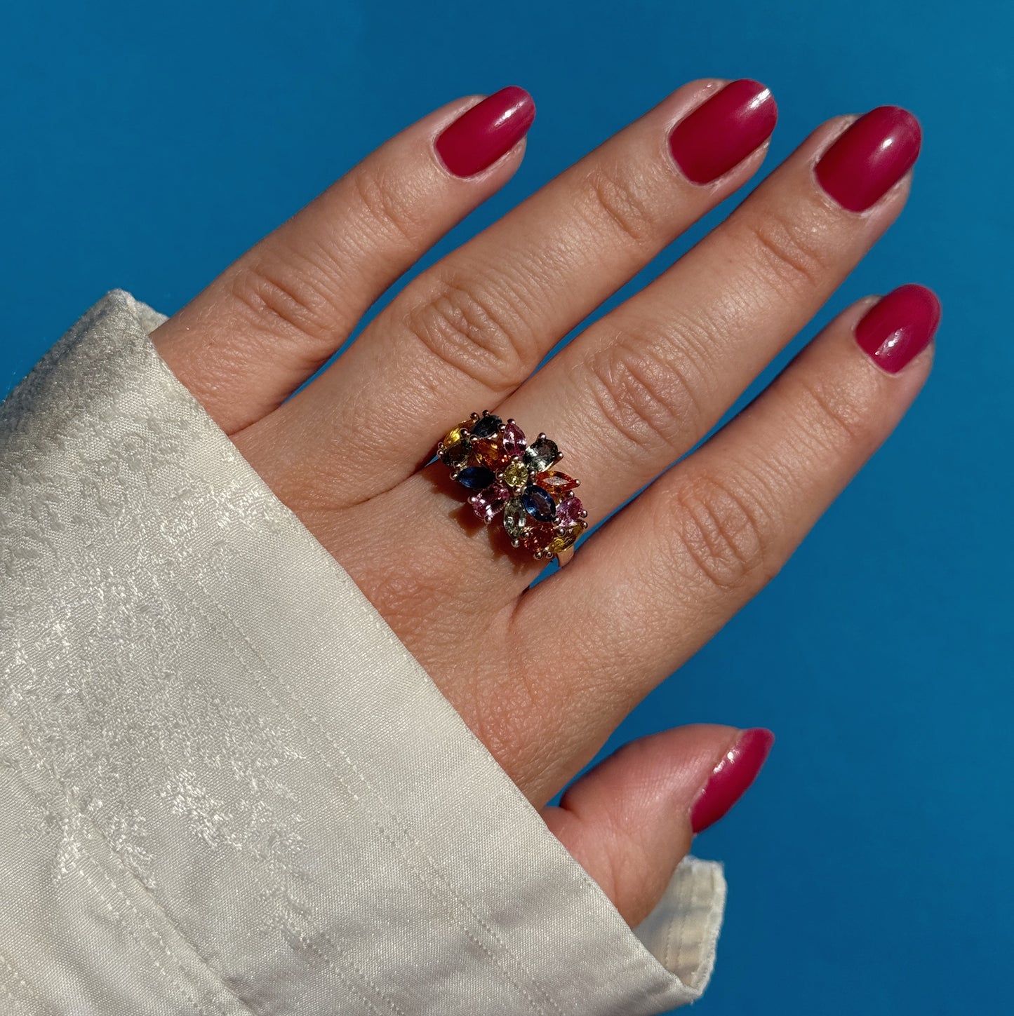 9 carat multi hue sapphire cocktail ring
