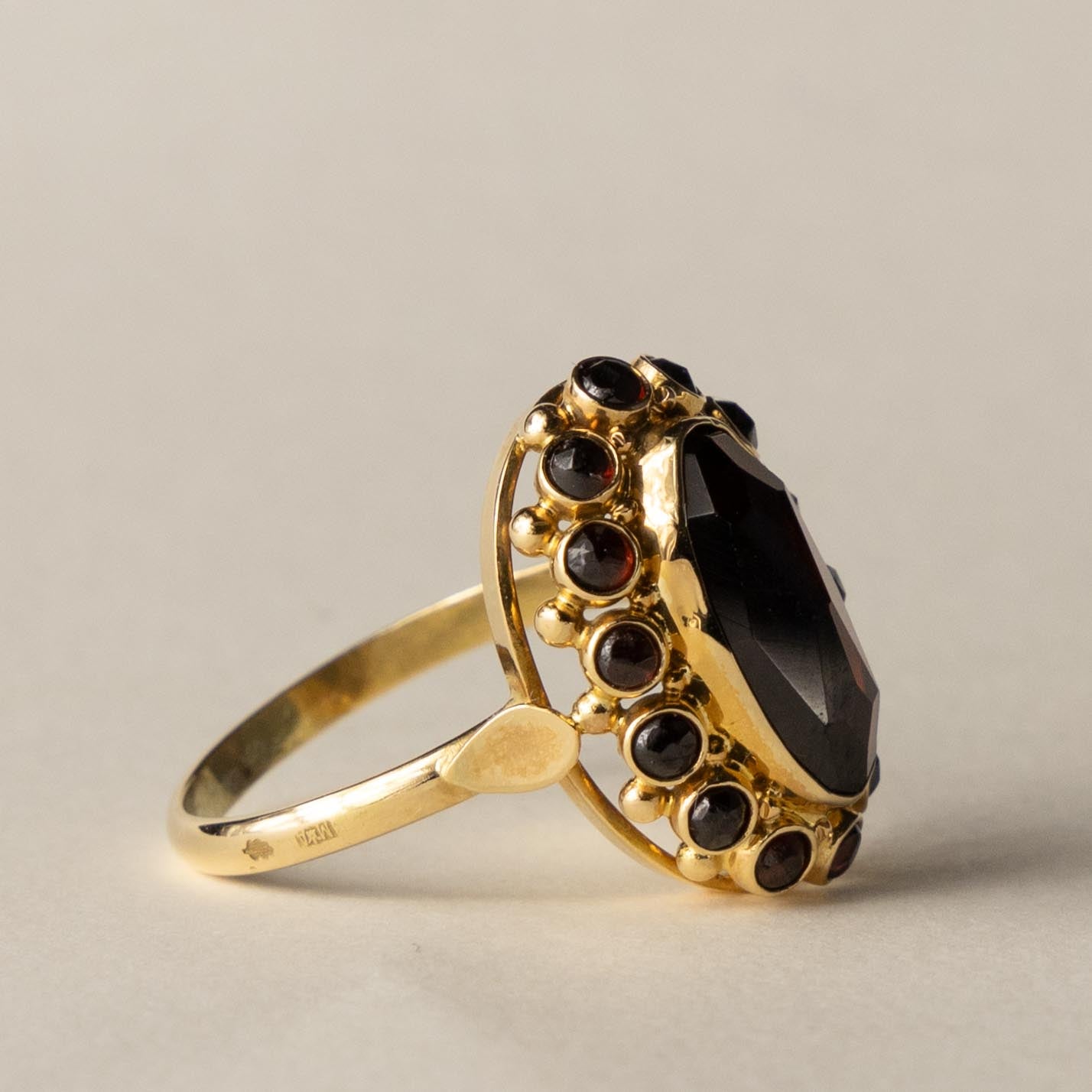 14ct garnet entourage ring