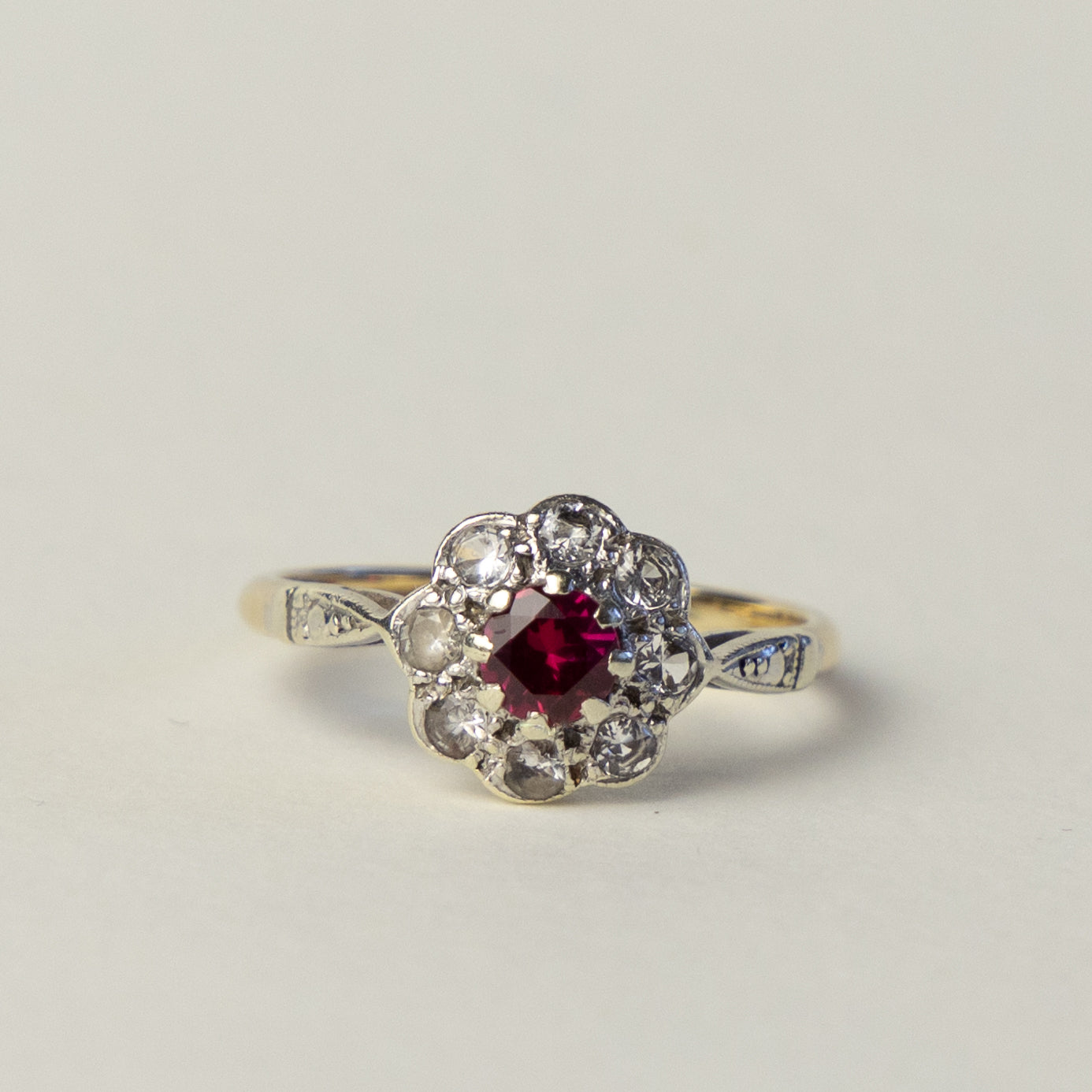 9 carat gold Art Deco flower ruby topaz ring