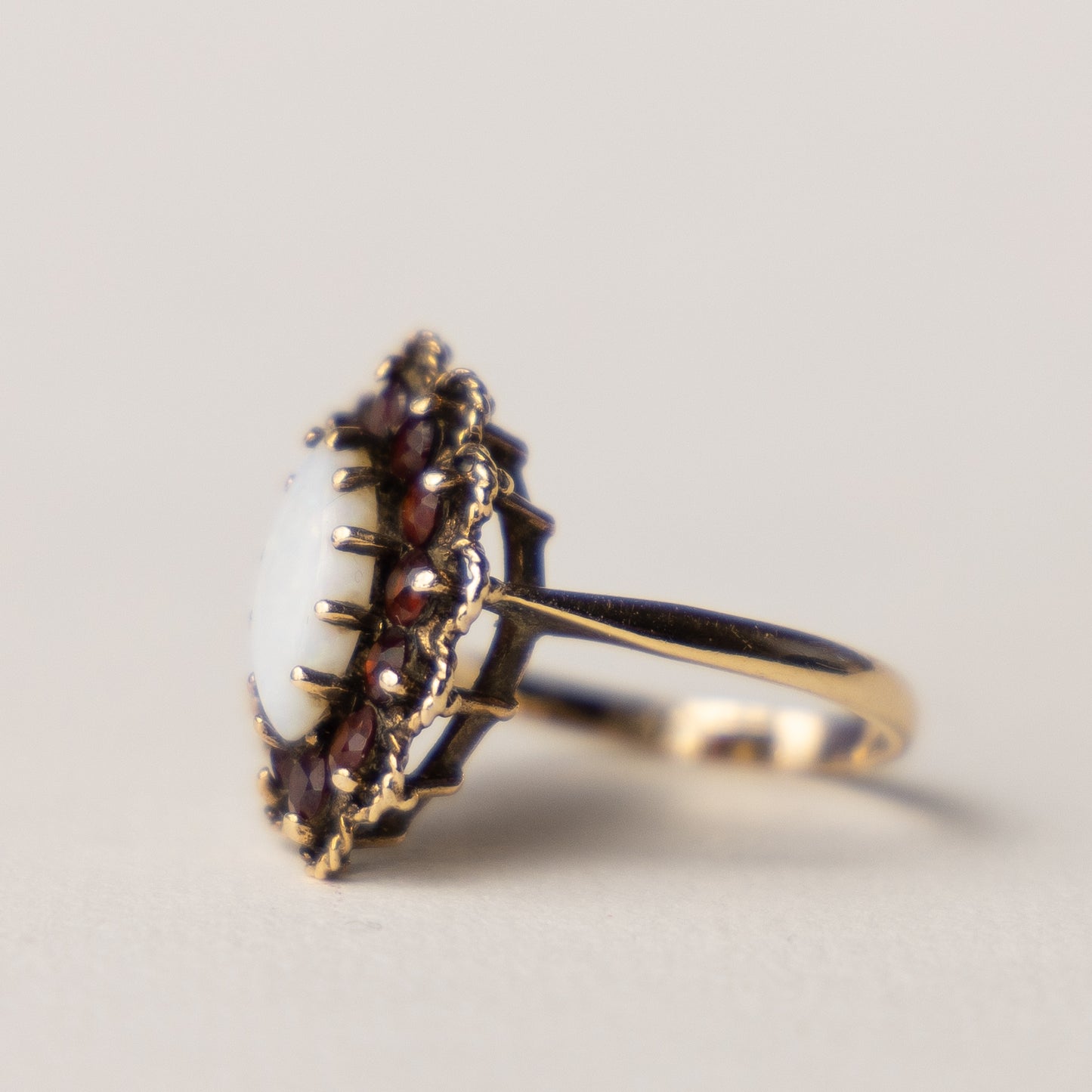 9 carat opal marquise garnet ring
