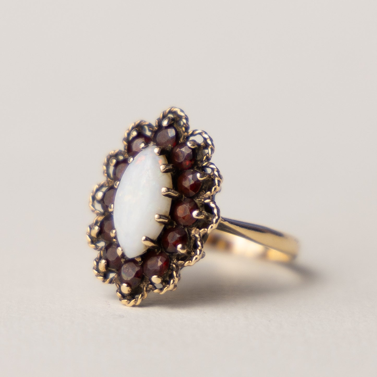 9 carat opal marquise garnet ring