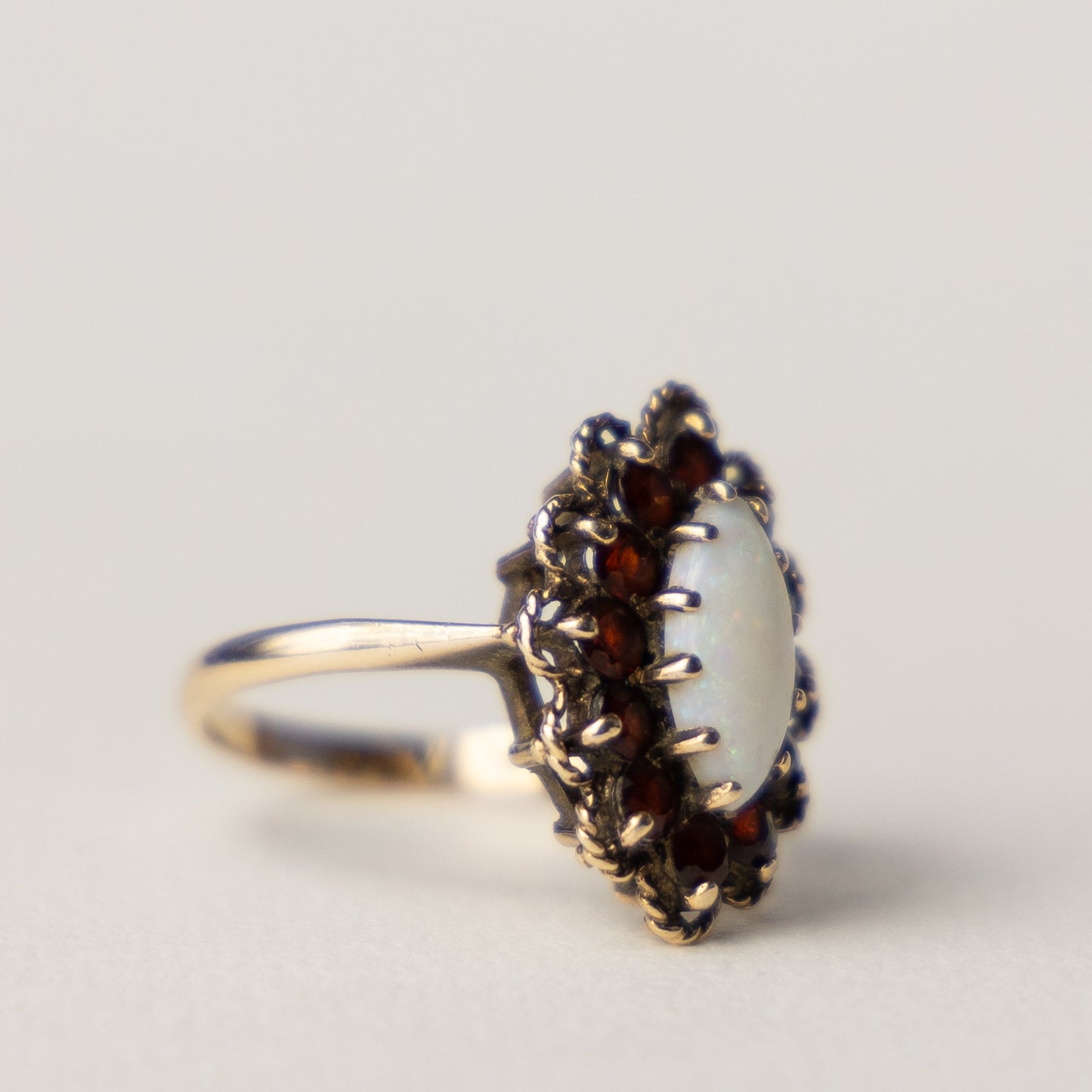9 carat opal marquise garnet ring