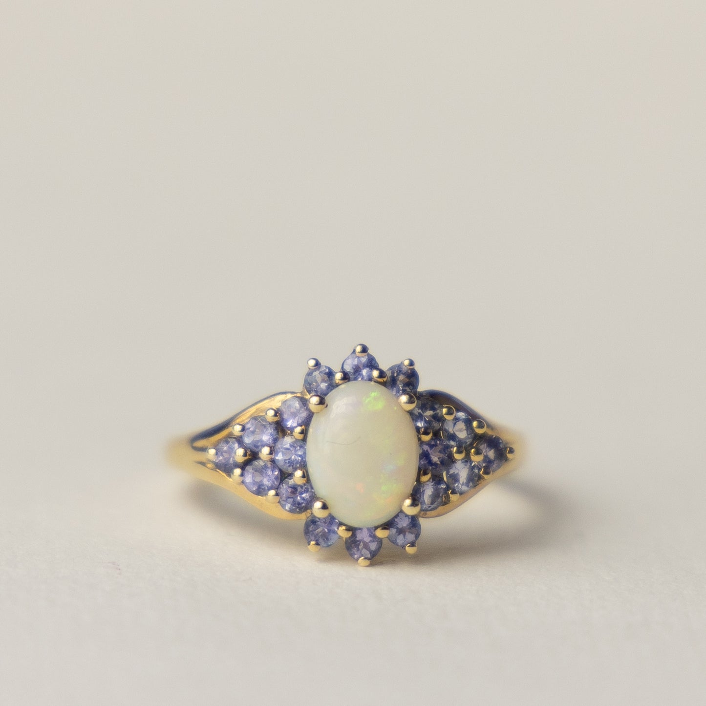 9 carat opal tanzanite cluster ring