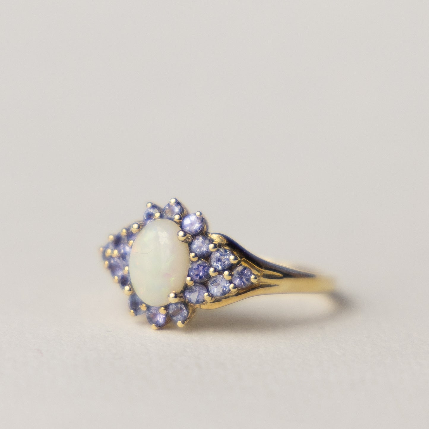 9 carat opal tanzanite cluster ring