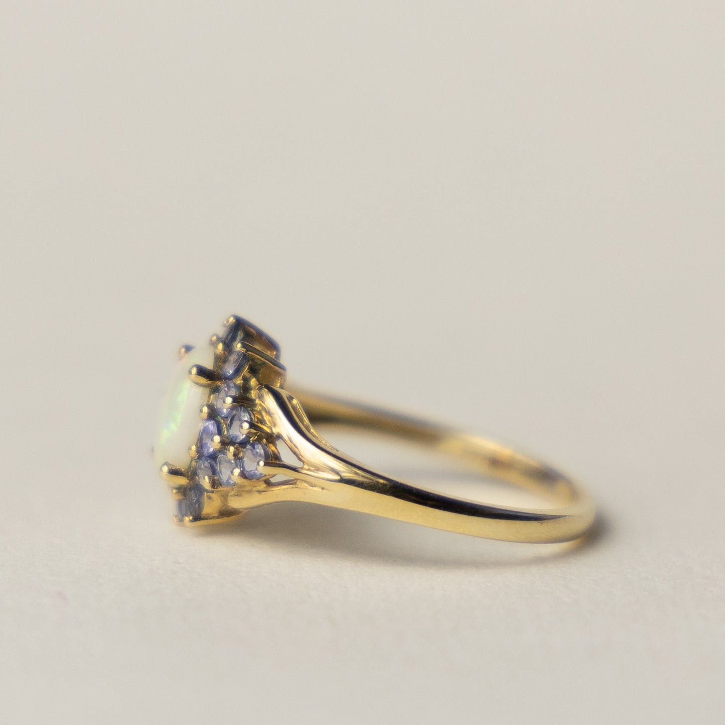 9 carat opal tanzanite cluster ring