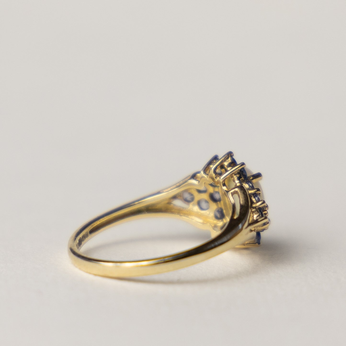 9 carat opal tanzanite cluster ring