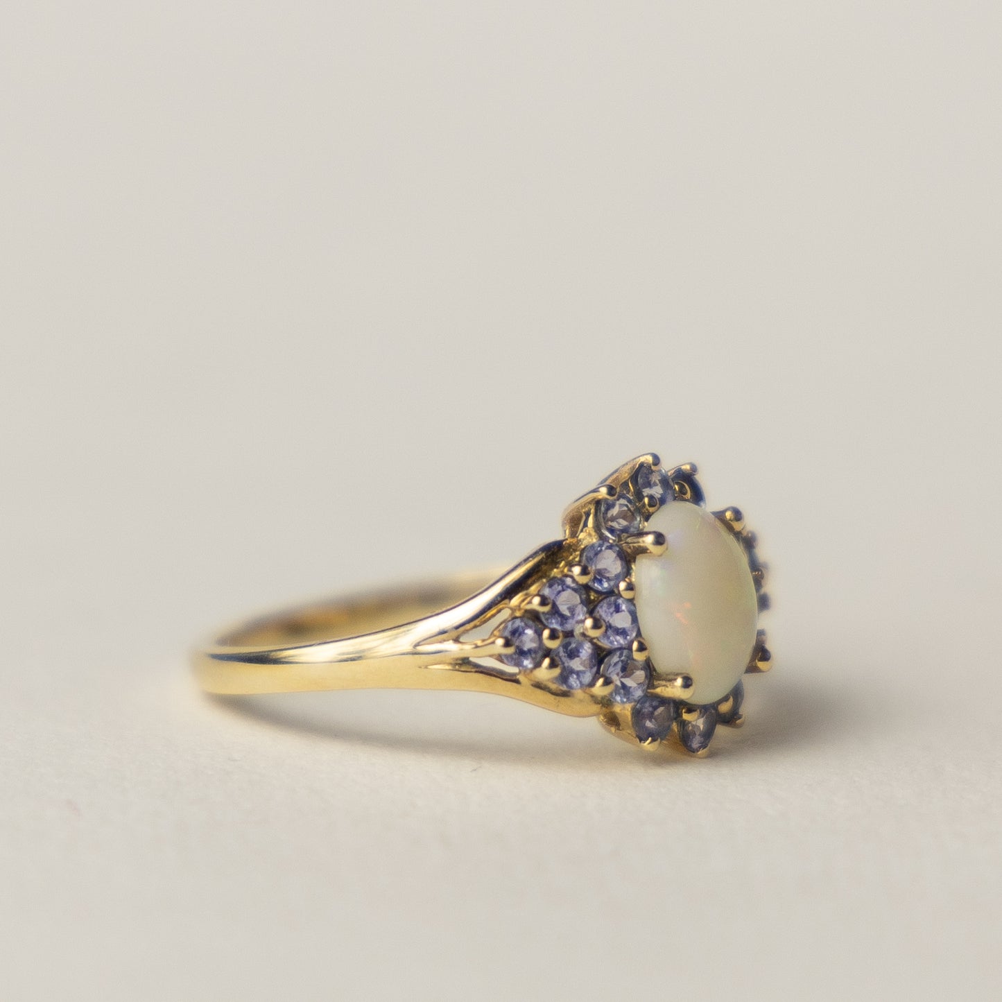 9 carat opal tanzanite cluster ring