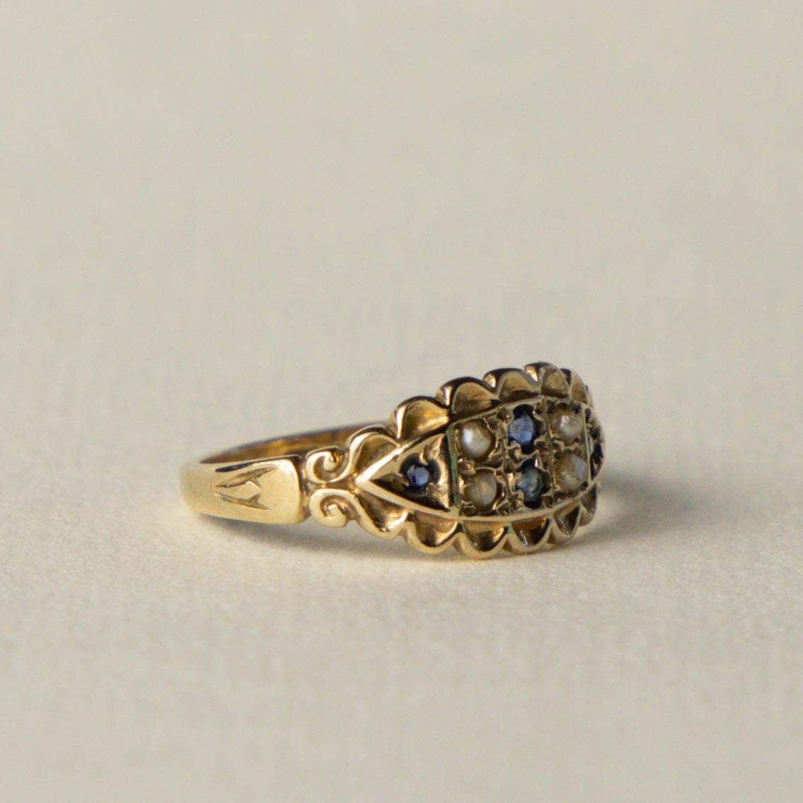 9ct gypsy sapphire & seed pearl ring