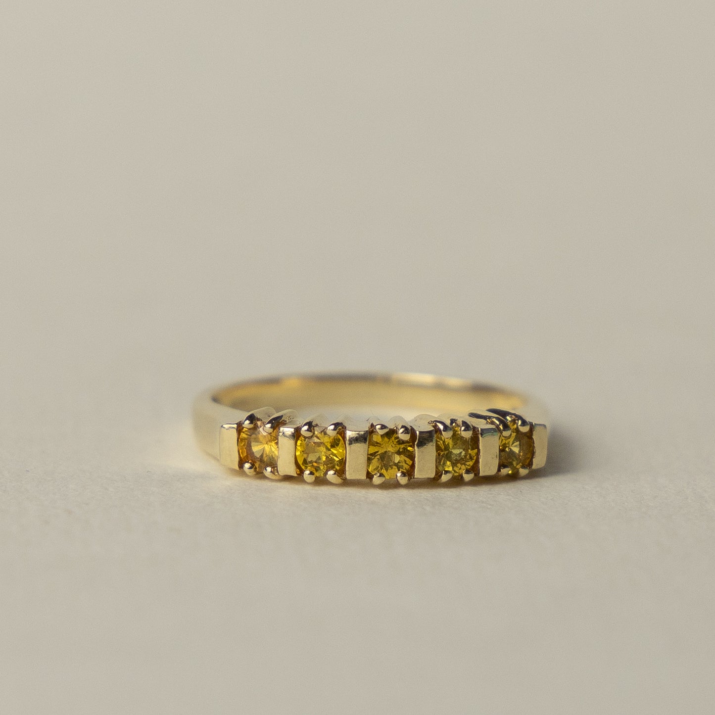 9 carat yellow topaz row ring