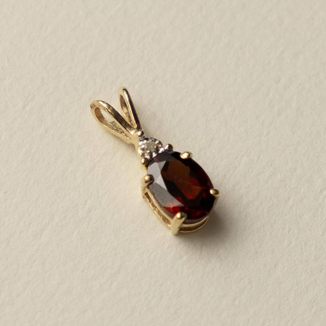 9ct garnet & diamond pendant