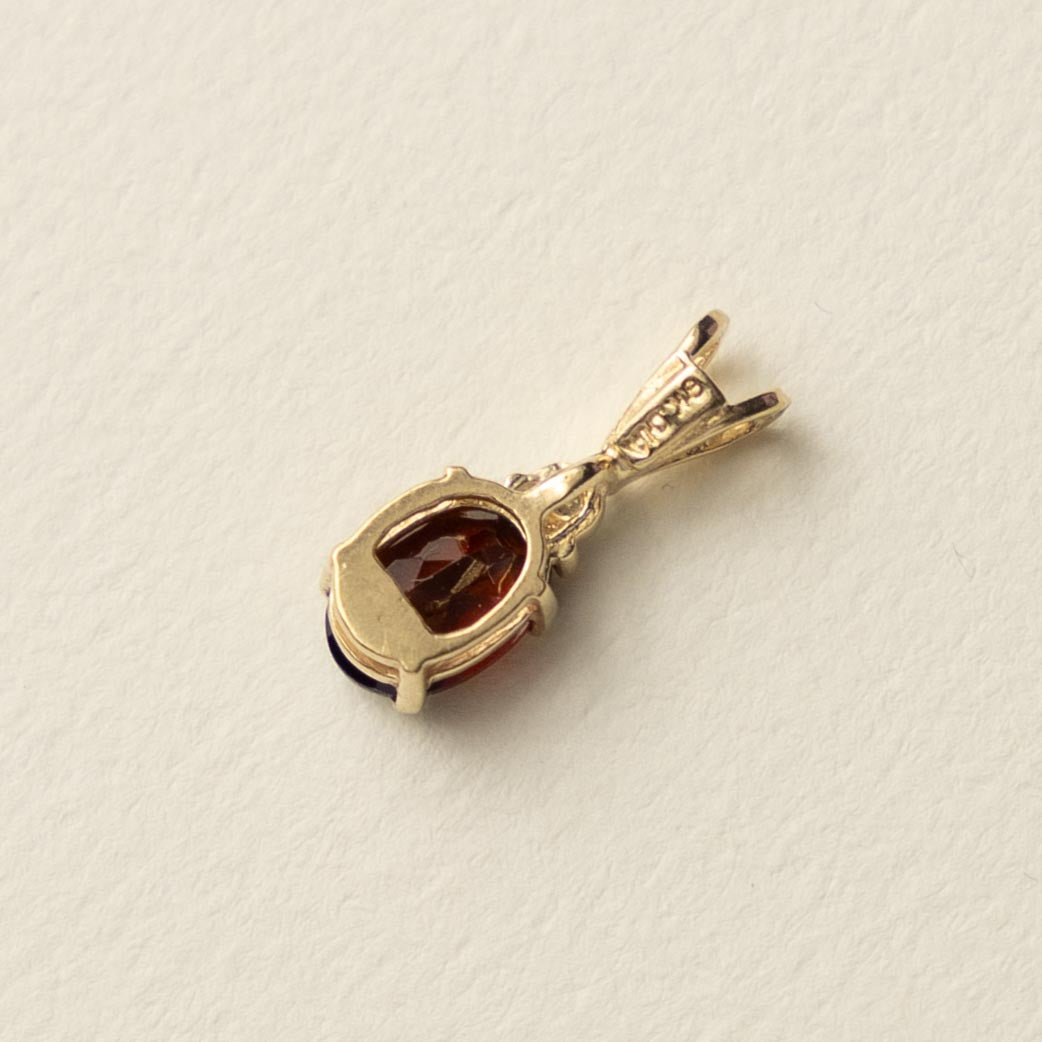 9ct garnet & diamond pendant