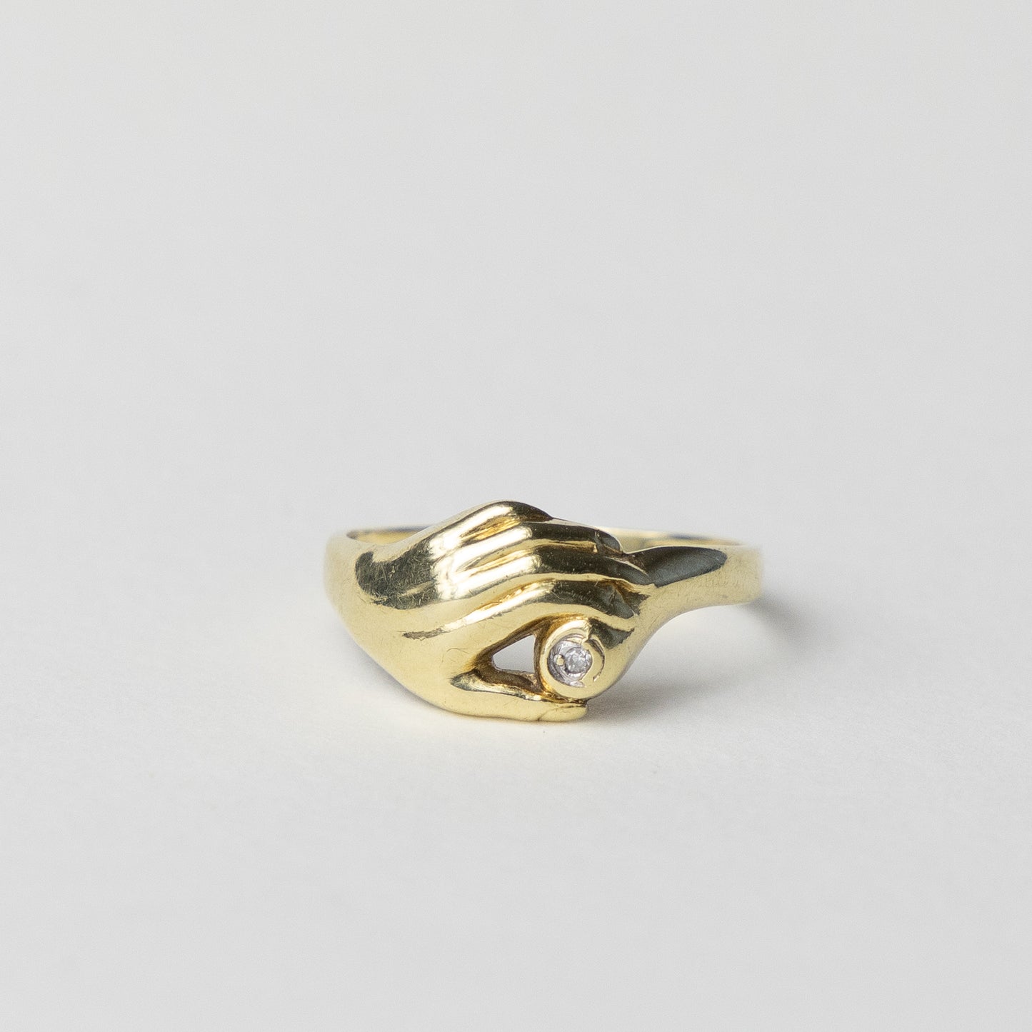 14 carat gold hand ring with diamond