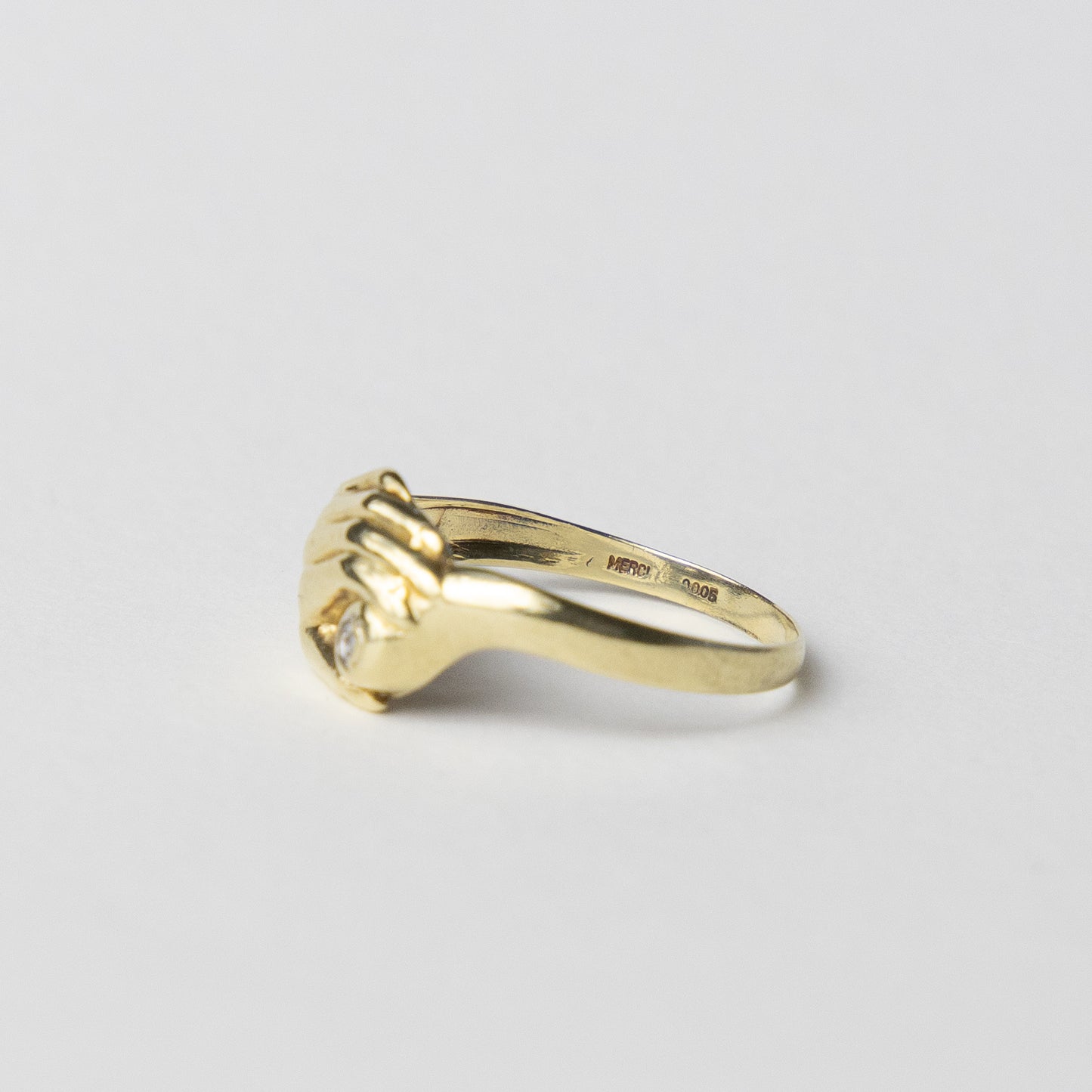 14 carat gold hand ring with diamond
