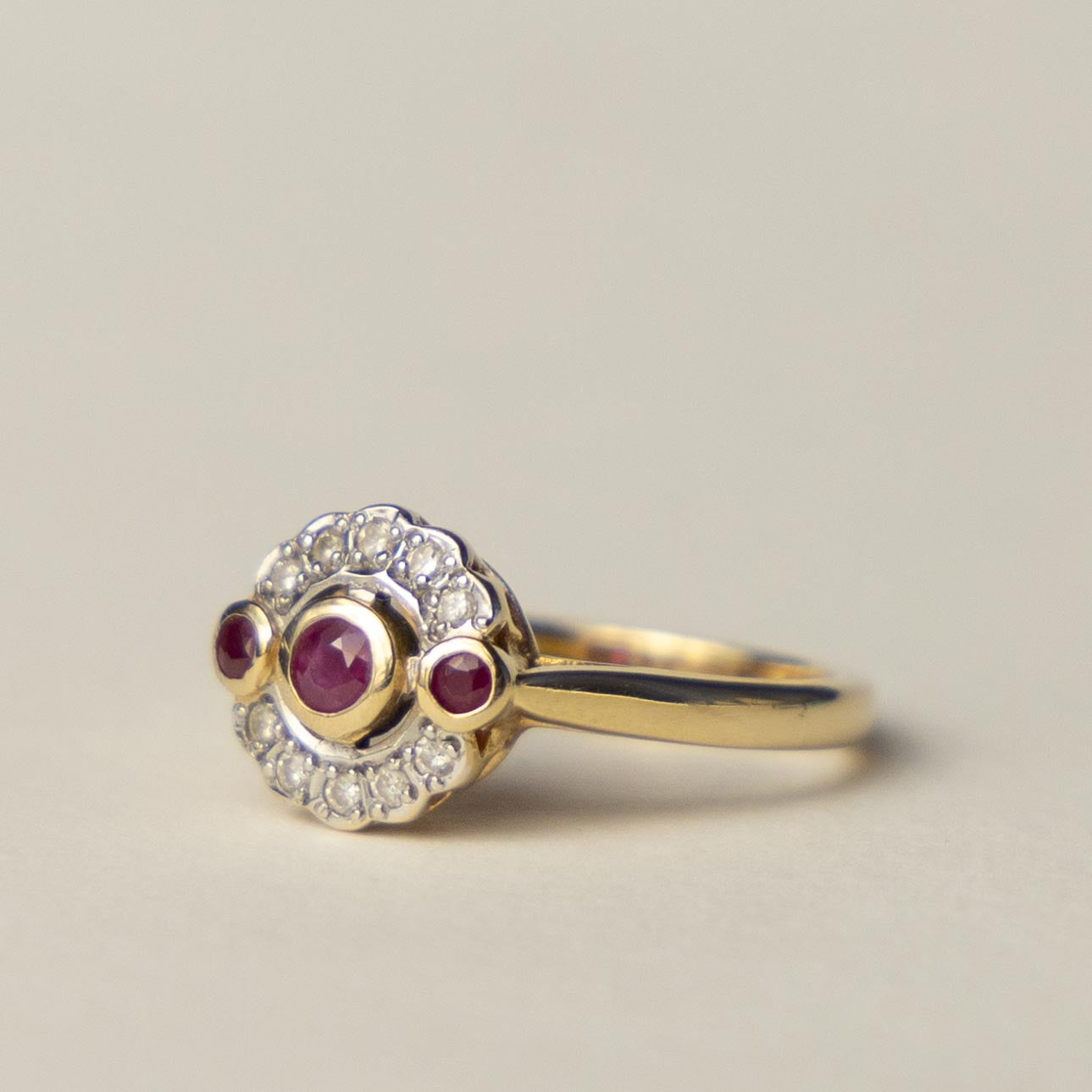 14ct diamond & ruby halo ring