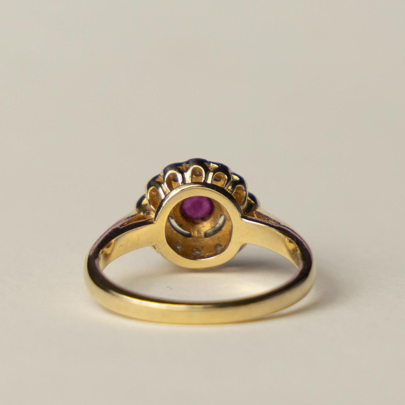 14ct diamond & ruby halo ring