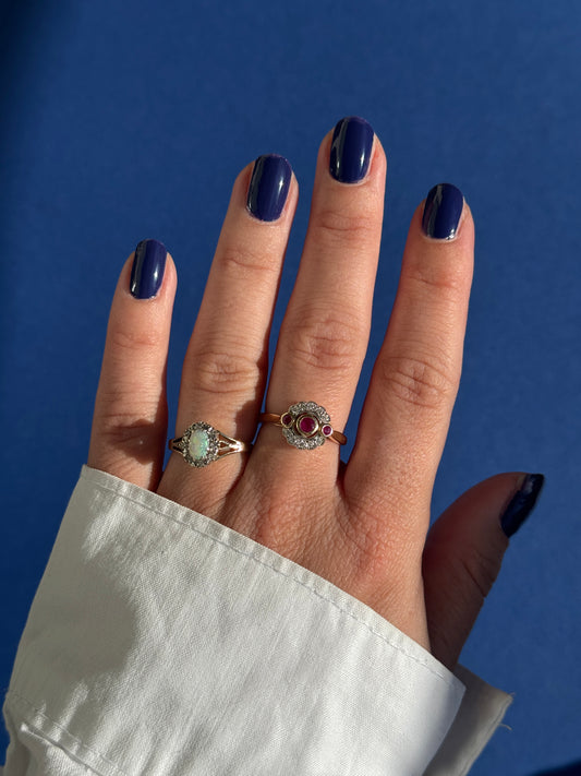 14ct diamond & ruby halo ring