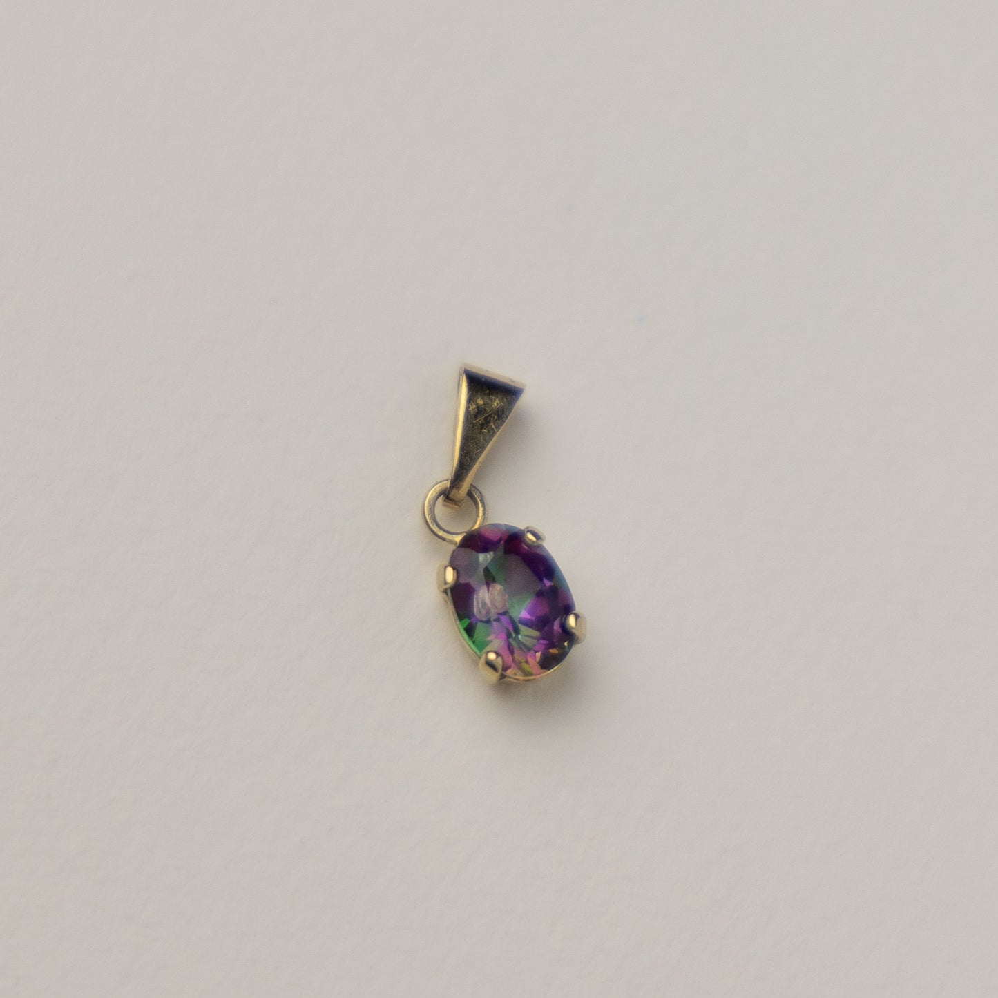 14 carat gold mystic topaz pendant