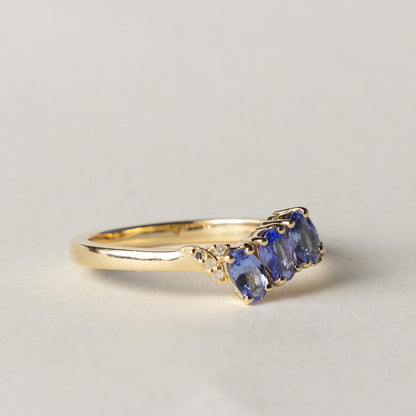 9ct tanzanite & diamond twist ring