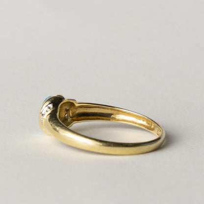 14ct blue topaz & diamond dress ring