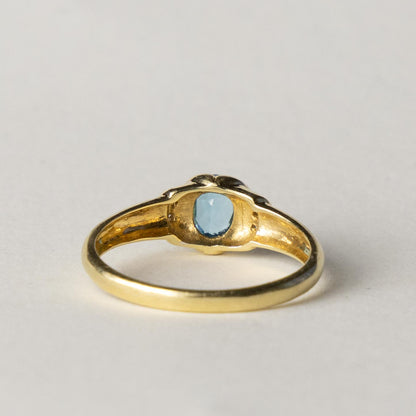 14ct blue topaz & diamond dress ring