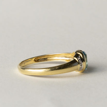 14ct blue topaz & diamond dress ring