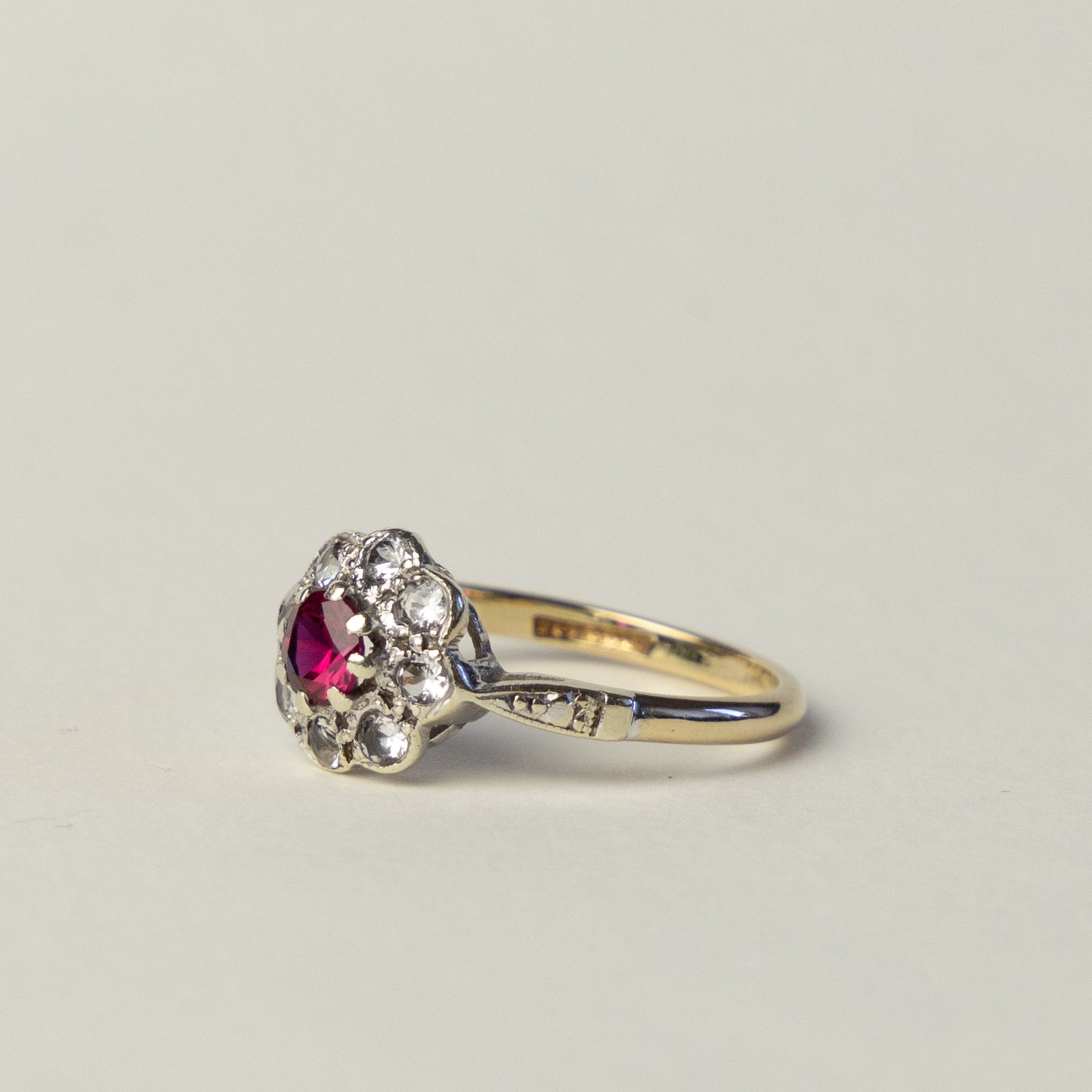 9 carat gold Art Deco flower ruby topaz ring