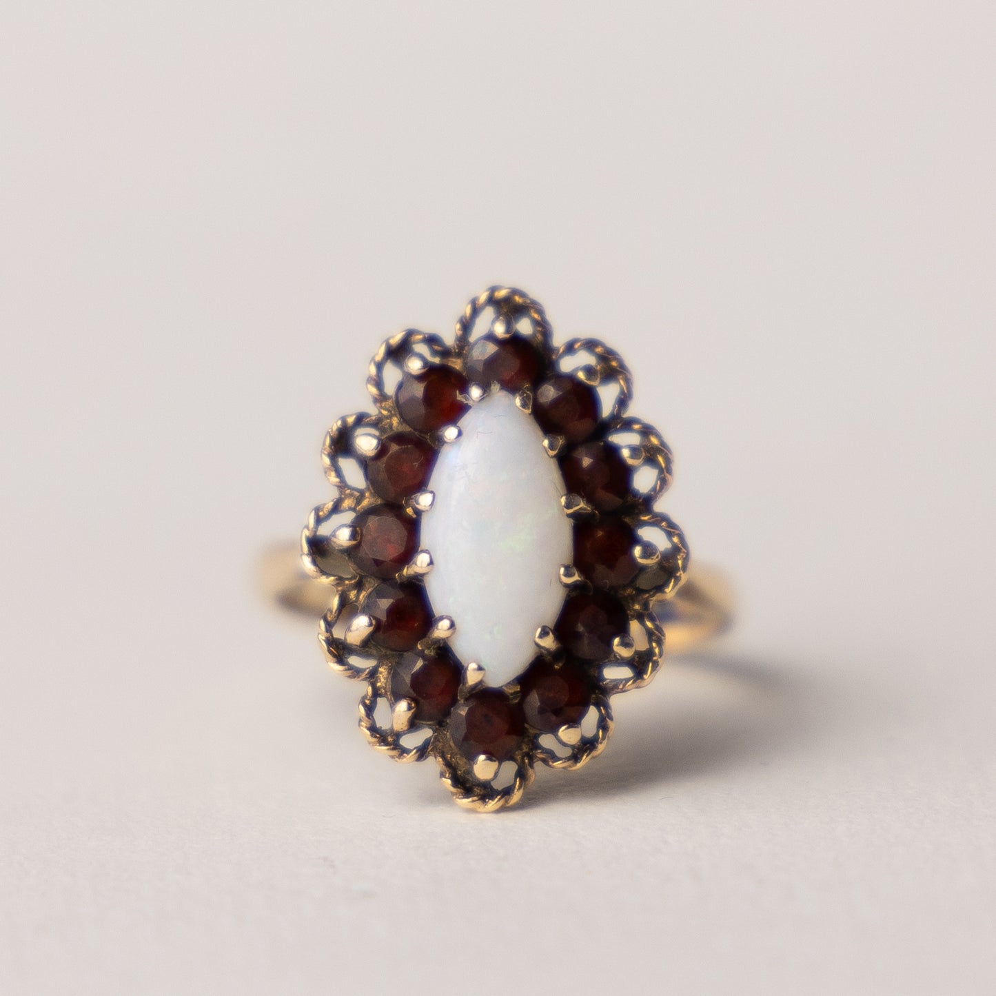 9 carat opal marquise garnet ring