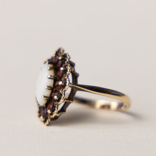 9 carat opal marquise garnet ring