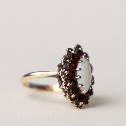 9 carat opal marquise garnet ring