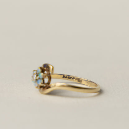 9 carat opal and diamond ring