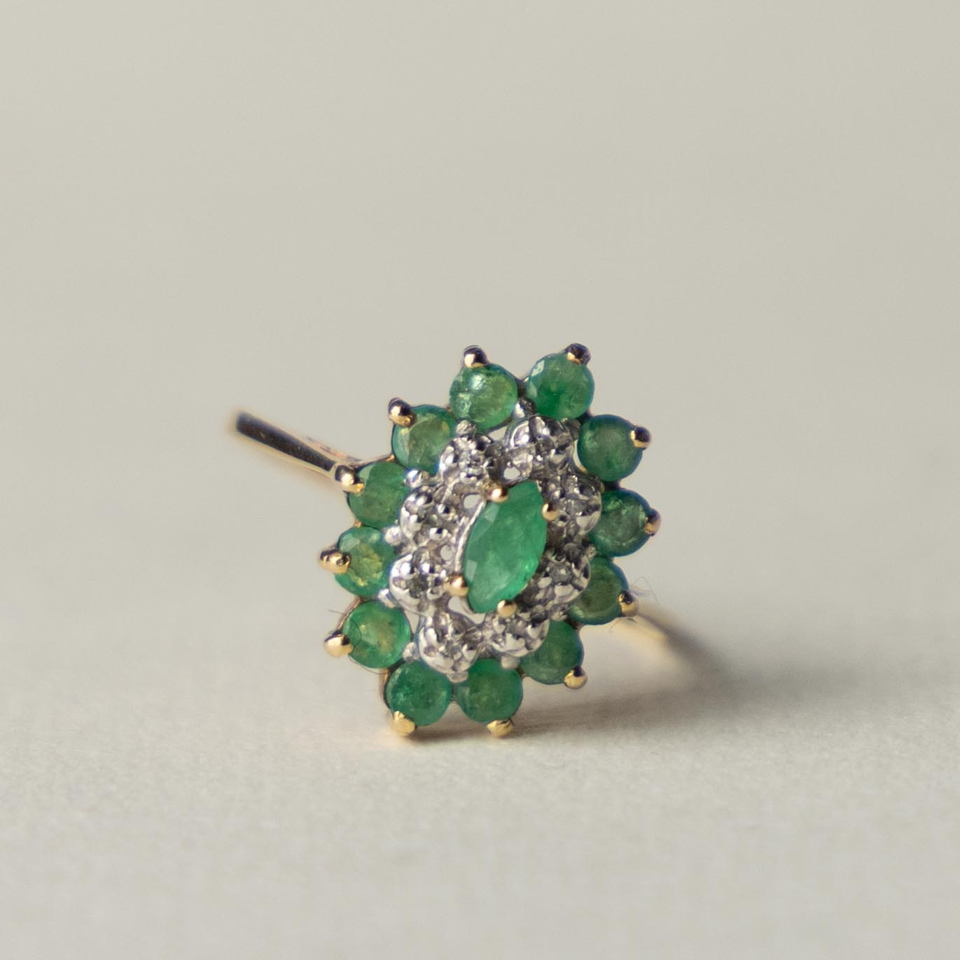 9ct emerald & diamond cluster