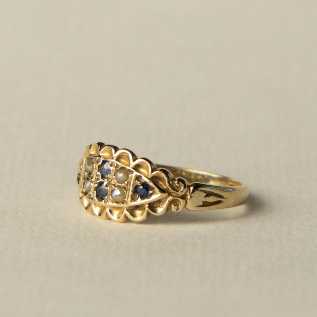 9ct gypsy sapphire & seed pearl ring