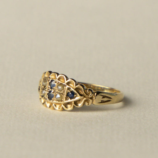9ct gypsy sapphire & seed pearl ring