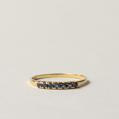 18ct saffire half eternity row ring