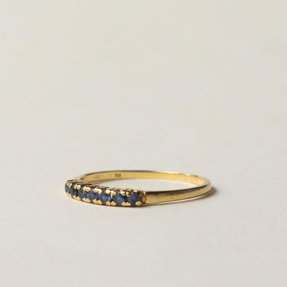 18ct saffire half eternity row ring