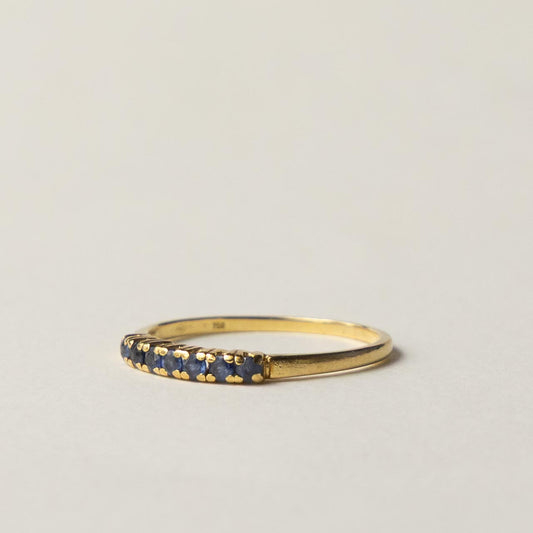18ct saffire half eternity row ring
