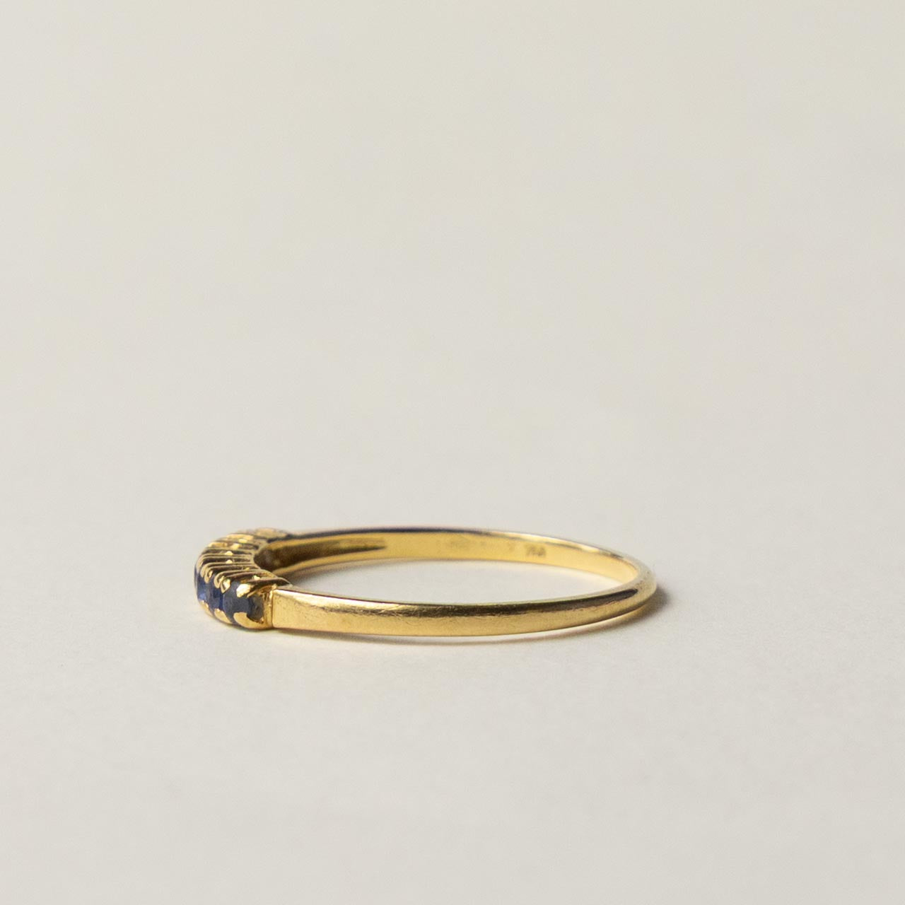 18ct saffire half eternity row ring