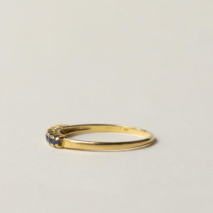 18ct saffire half eternity row ring