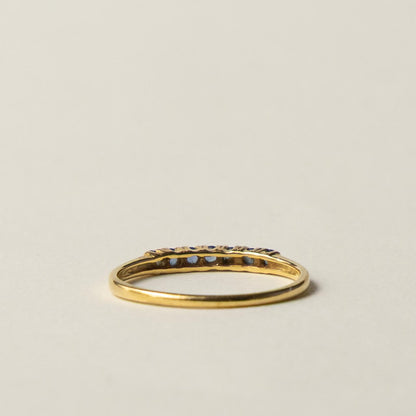 18ct saffire half eternity row ring