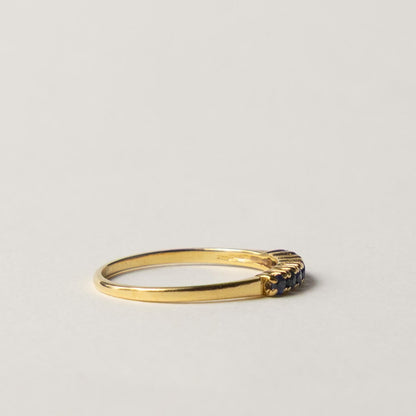 18ct saffire half eternity row ring