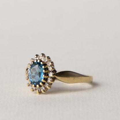 9ct Diana halo blue topaz & diamond