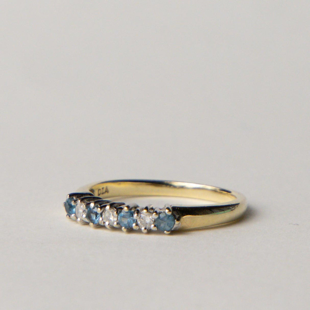 9ct blue topaz & diamond row ring