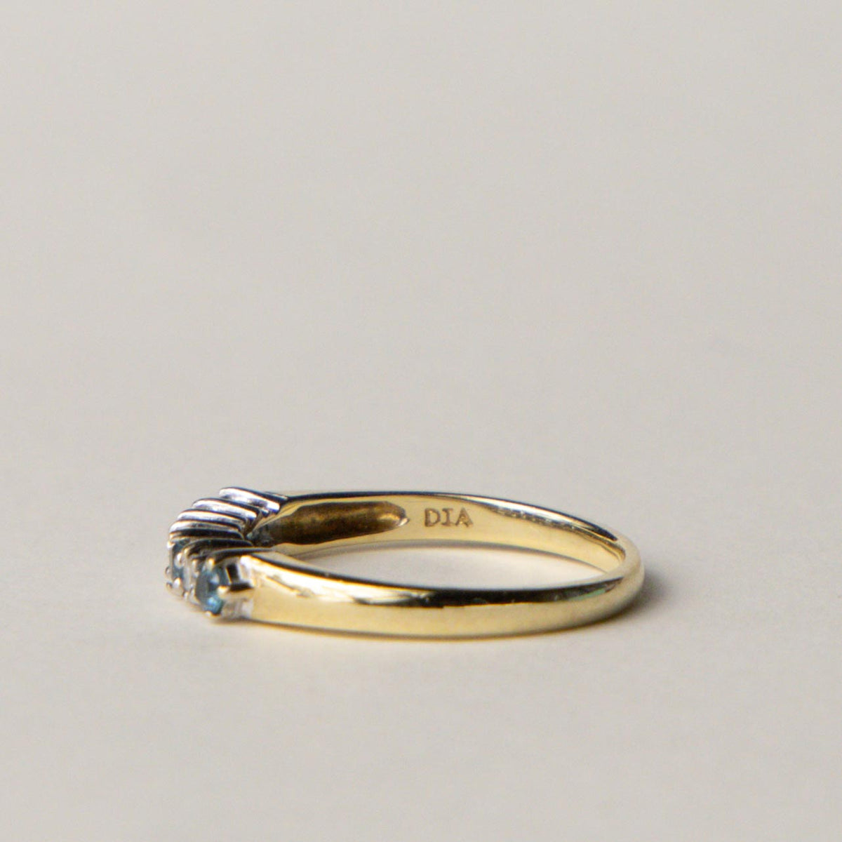 9ct blue topaz & diamond row ring