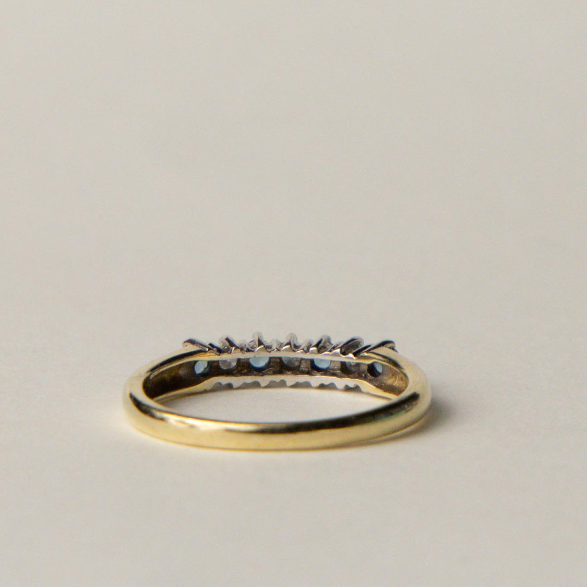 9ct blue topaz & diamond row ring