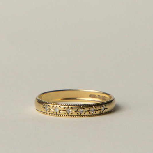 9ct starburst diamond row ring