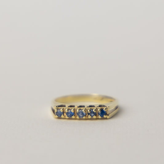 14 carat gold tanzanite half eternity ring