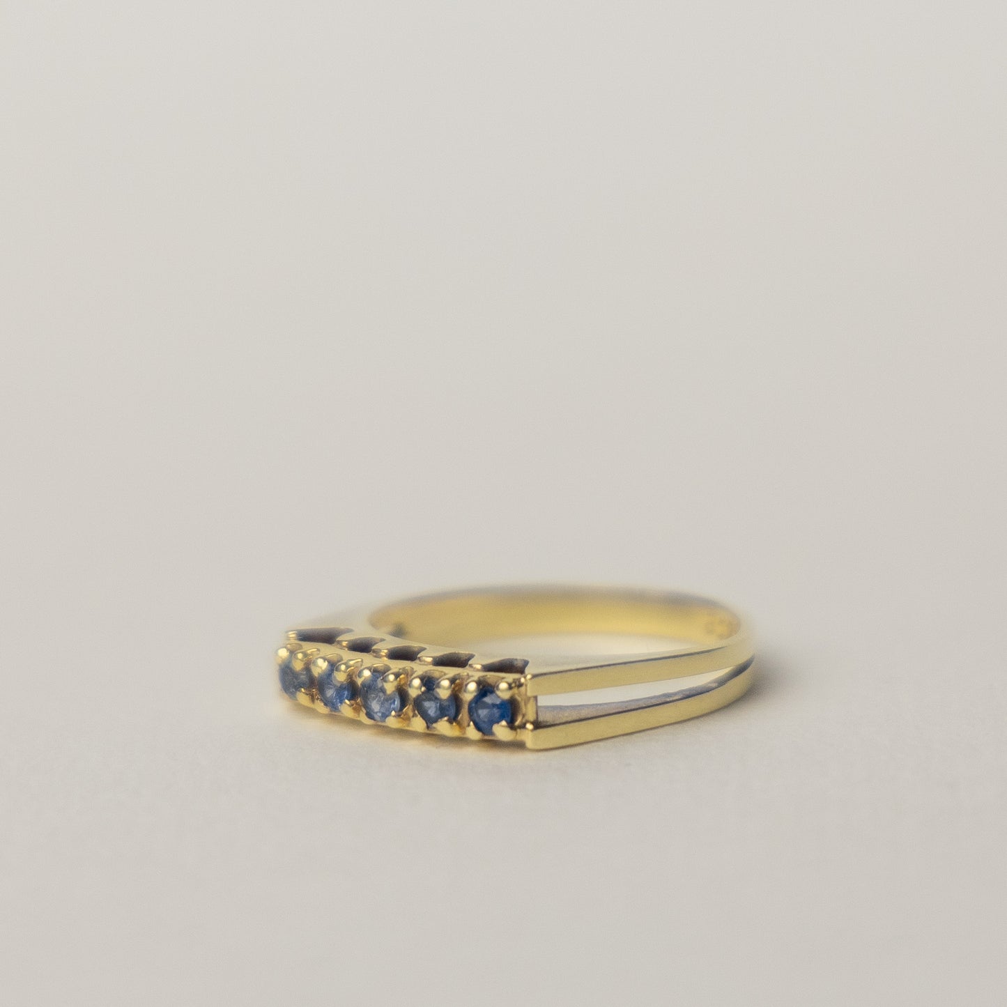 14 carat gold tanzanite half eternity ring