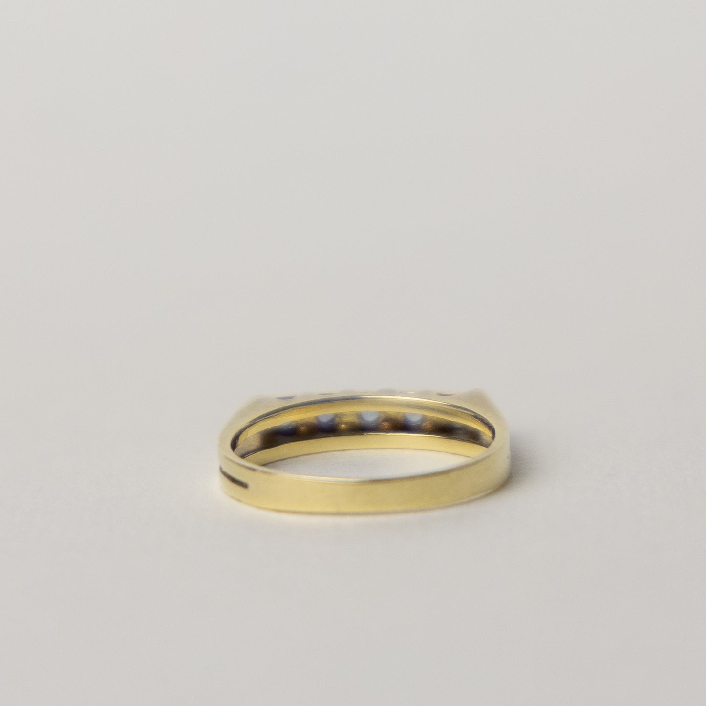 14 carat gold tanzanite half eternity ring