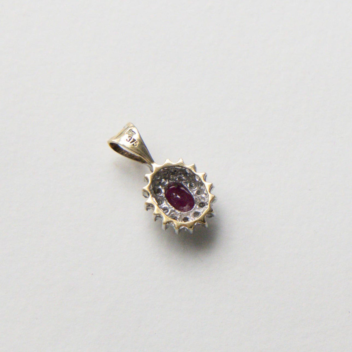 9ct ruby & diamond halo pendant