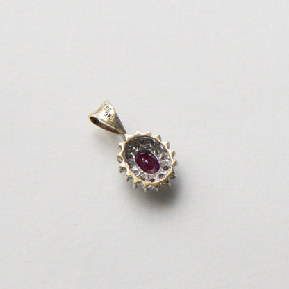 9ct ruby & diamond halo pendant